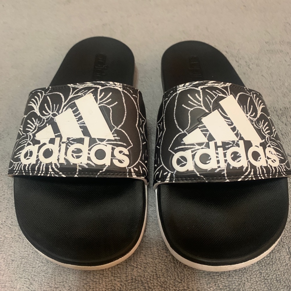 Black slip on adidas, with flower print, size 6.5